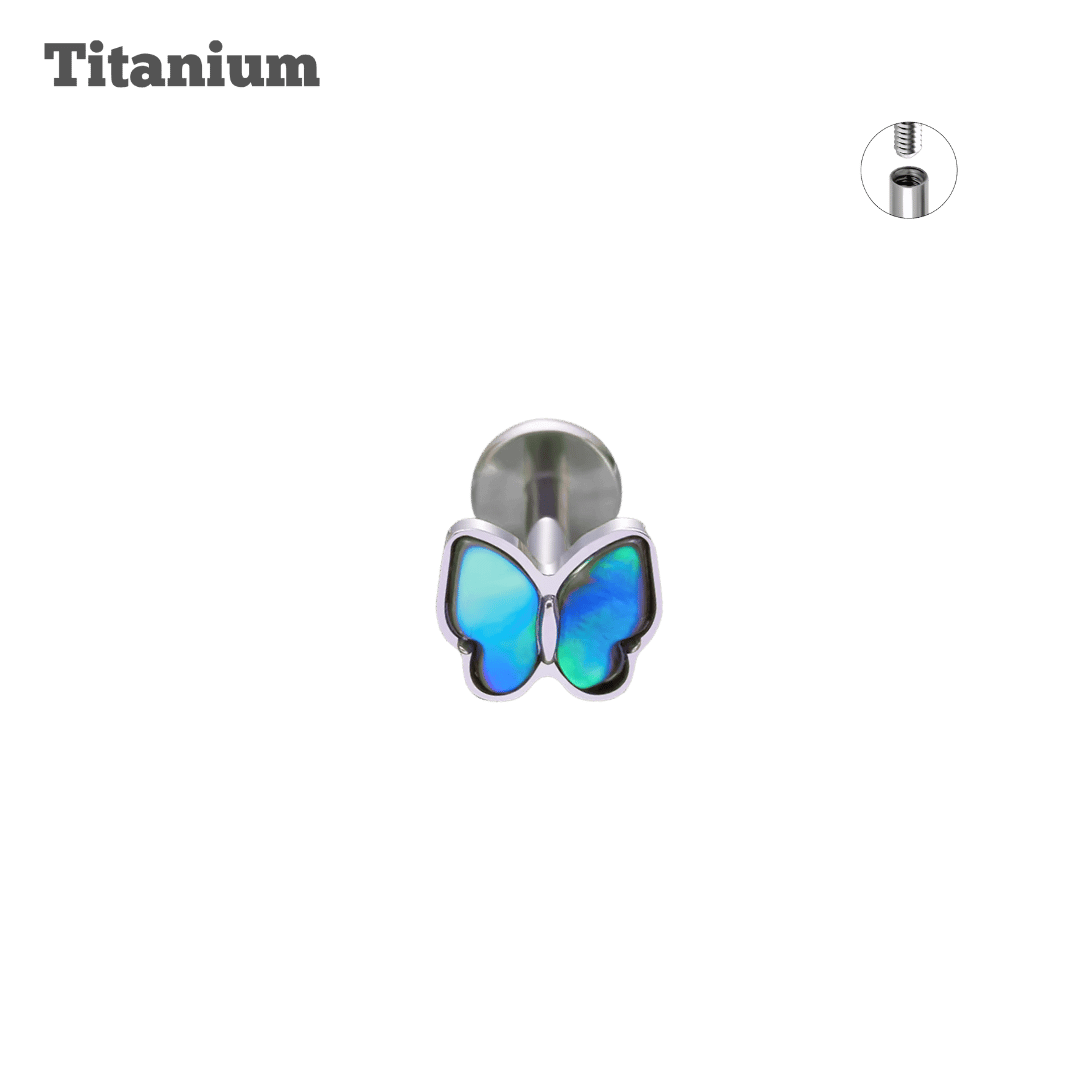 Bluegreen Butterfly-shaped earring with blue design on a black background