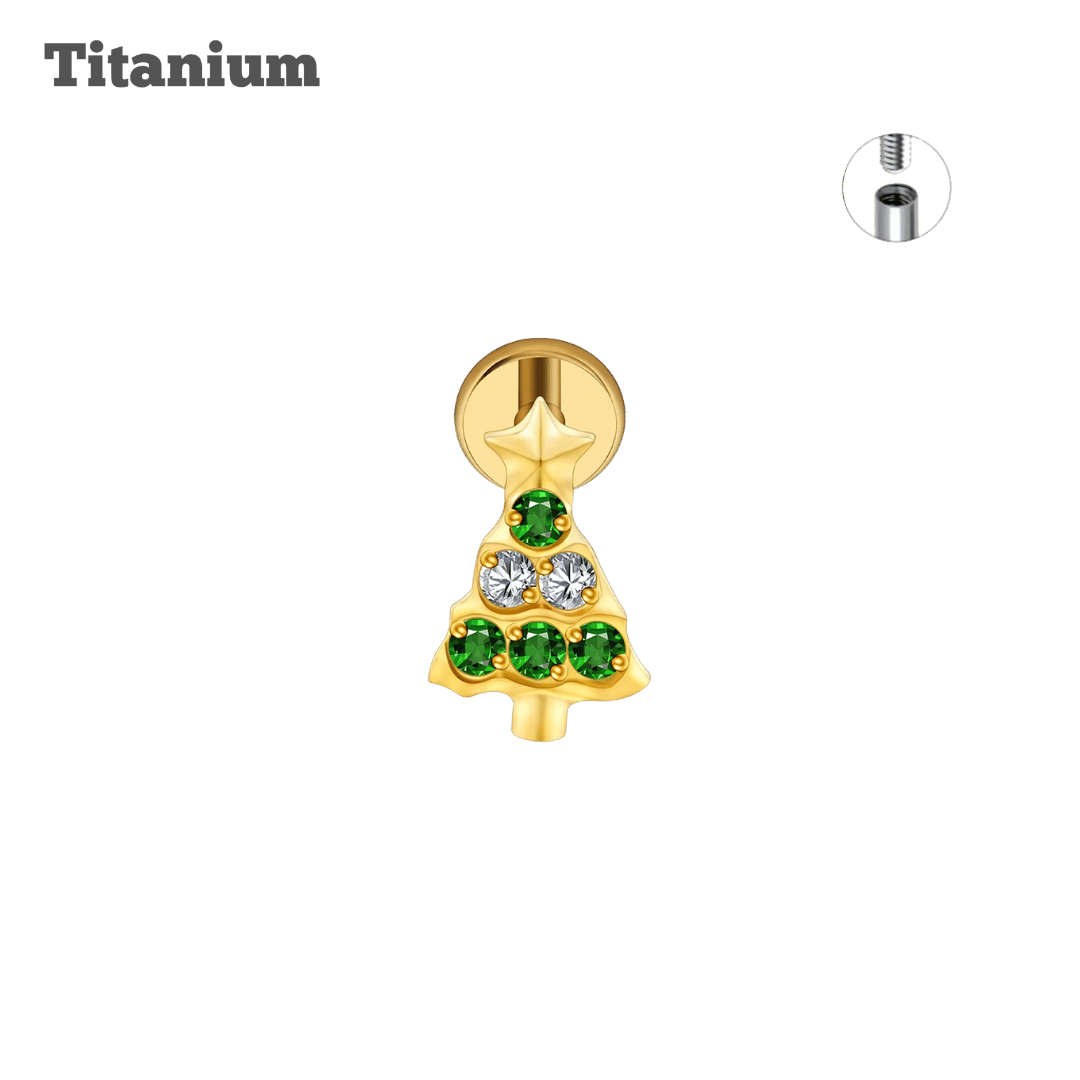 Gold Christmas tree-shaped earring with green gemstones on a black background